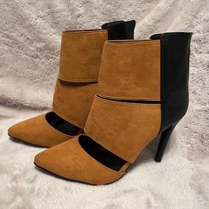 Guilty Soles high heels. Black and Brown. Size 9. Never worn